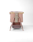 CoZee Air 2 bedside crib in blush with 6 height positions and storage in a white background