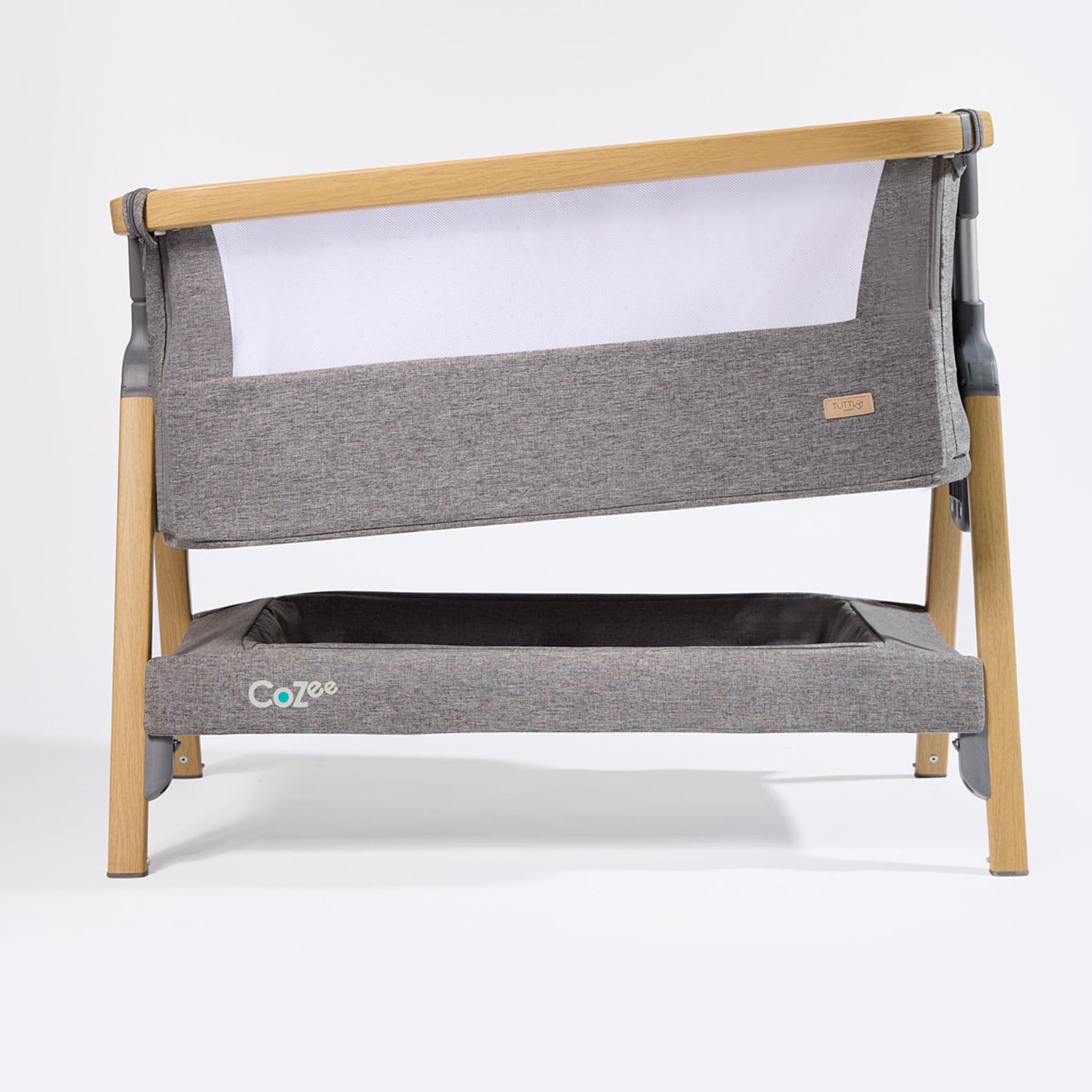 CoZee Bedside Crib in Oak and Charcoal – product cutout showing adjustable height settings