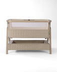CoZee Zen green baby crib with mesh and quilted lining sides, storage and sensory bar on a white background