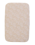 Fitted sheet with an abstract linear pattern in warm oat and cream hues, on a white background