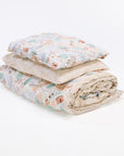 good life duvet cover and pillowcase set folded and stacked, featuring soft neutral tones and coordinating patterned duvet and pillowcase.