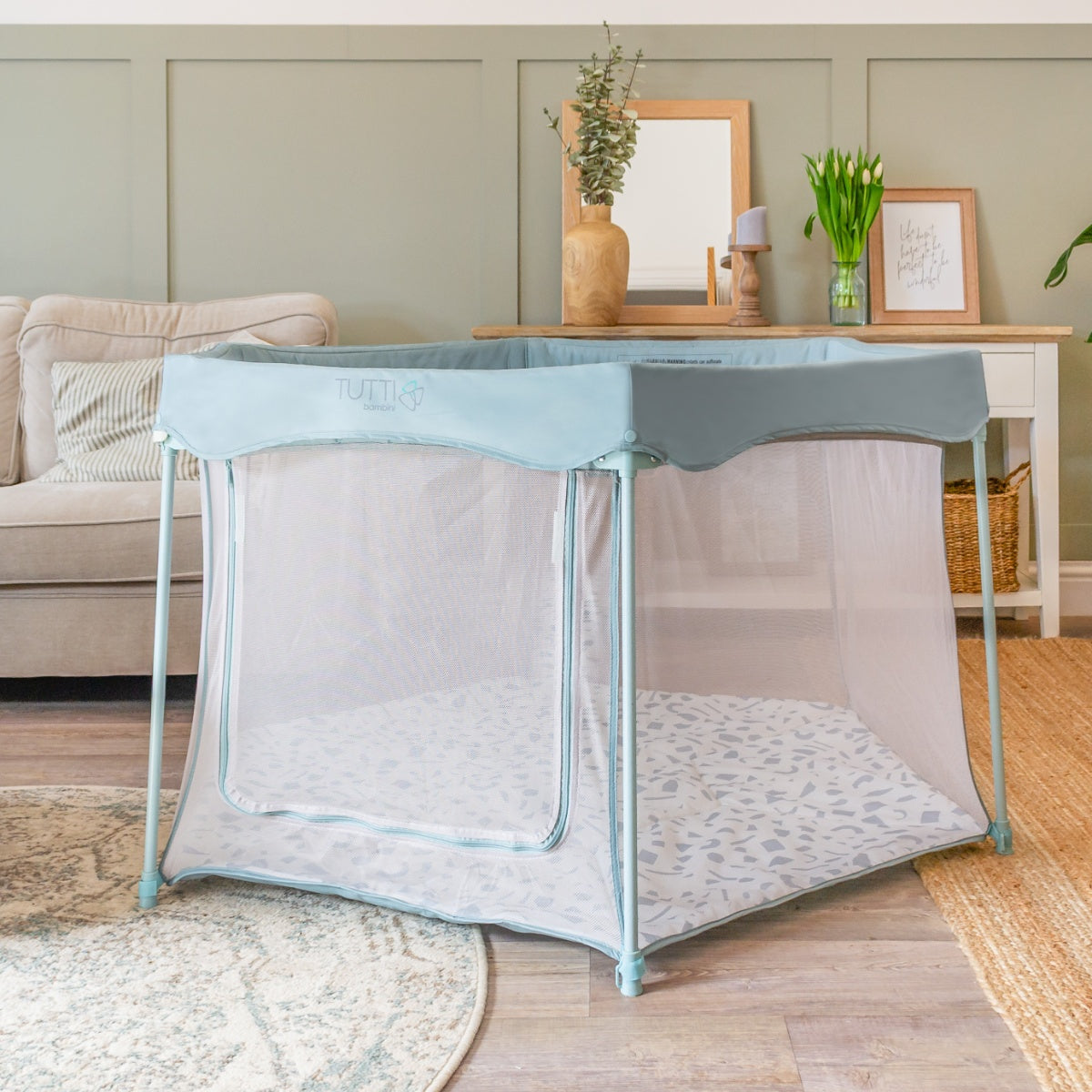 Room view of the Hexa playpen in Ocean Stone Terrazzo featuring mesh sides, zipped access and a softly padded terrazzo base