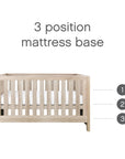 Modena Cot Bed in Oak showing adjustable mattress base with 3 height positions for added convenience and safety as baby grows