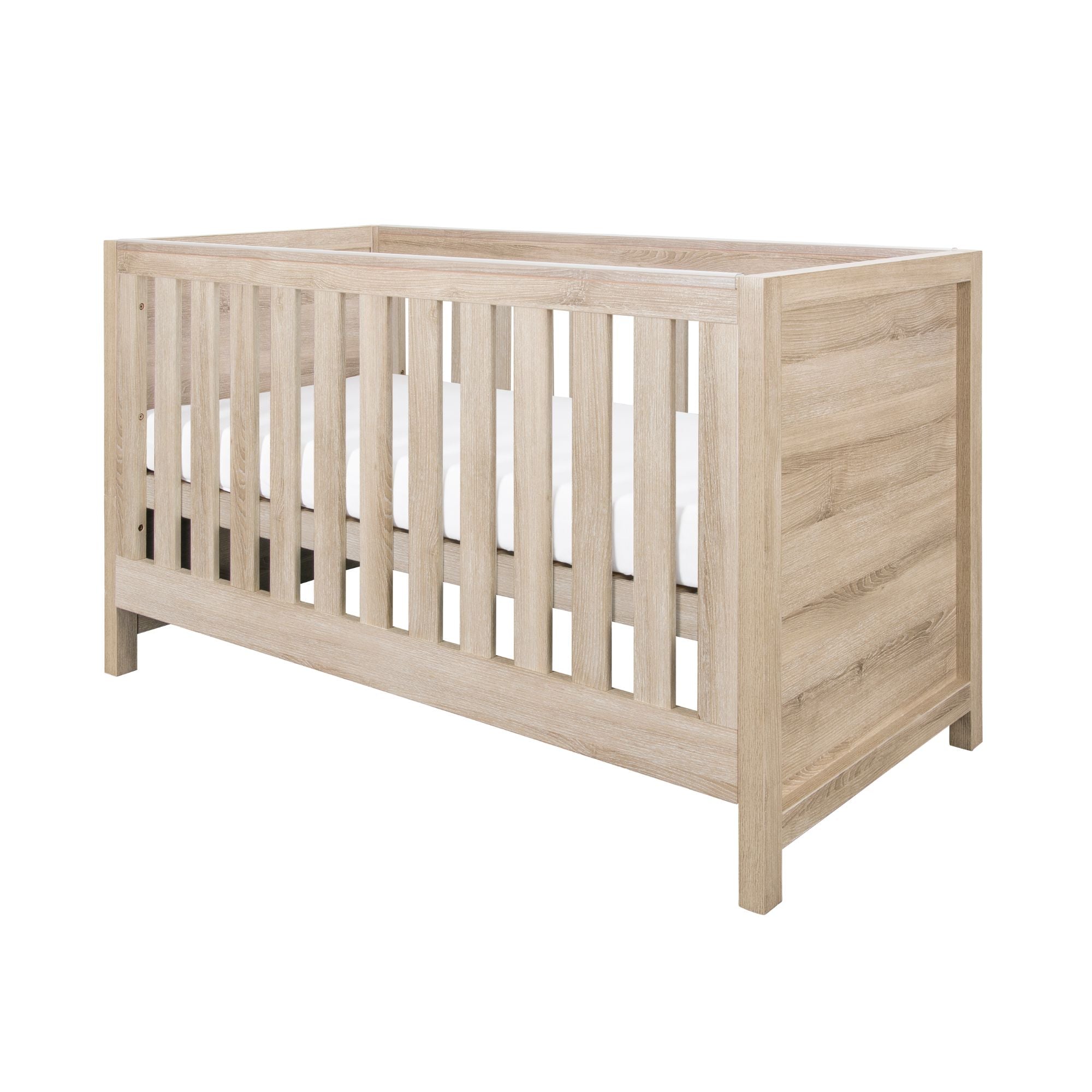 Modena Cot Bed in Oak with a contemporary slatted design and neutral wood finish, suitable for modern nursery interiors