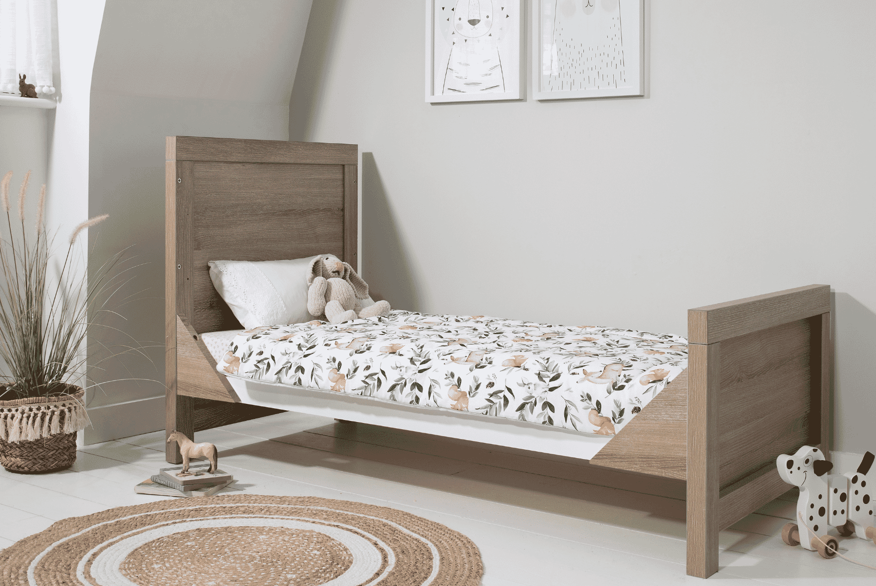 The Modena cot bed easily converts to toddler bed and sofa