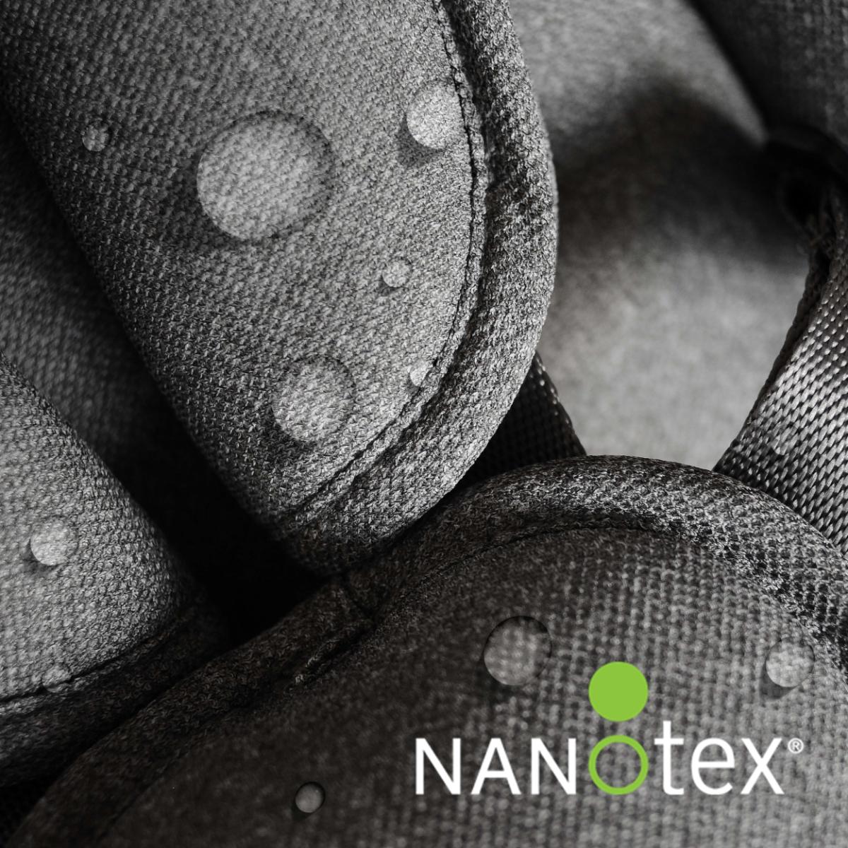 Close-up view of the Nova Rocker showing Nanotex water-repellent fabric with water droplets for easy cleaning and stain resistance.