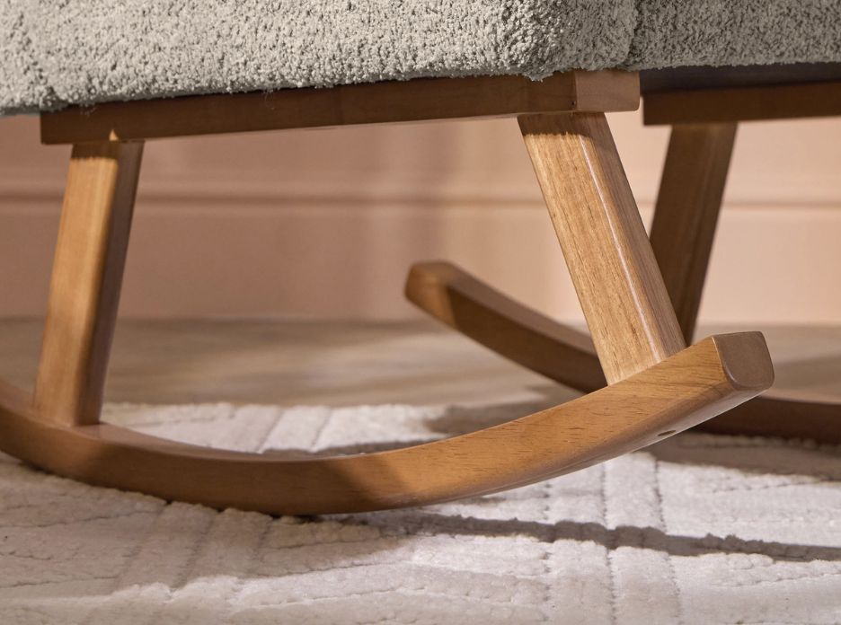 Close-up of curved oak rockers on the Oscar Luxe chair in teddy mushroom, highlighting smooth rocking motion and natural wood tones