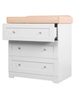 Angled cutout view of the Rio chest changer in dove grey and honey oak, highlighting smooth-glide drawers and generous storage space