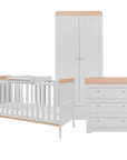 Front-facing view of the Rio three-piece room set in Honey Oak and Dove Grey on a white background, featuring a cot bed with top changer, a double wardrobe, and a chest changer with three spacious drawers.