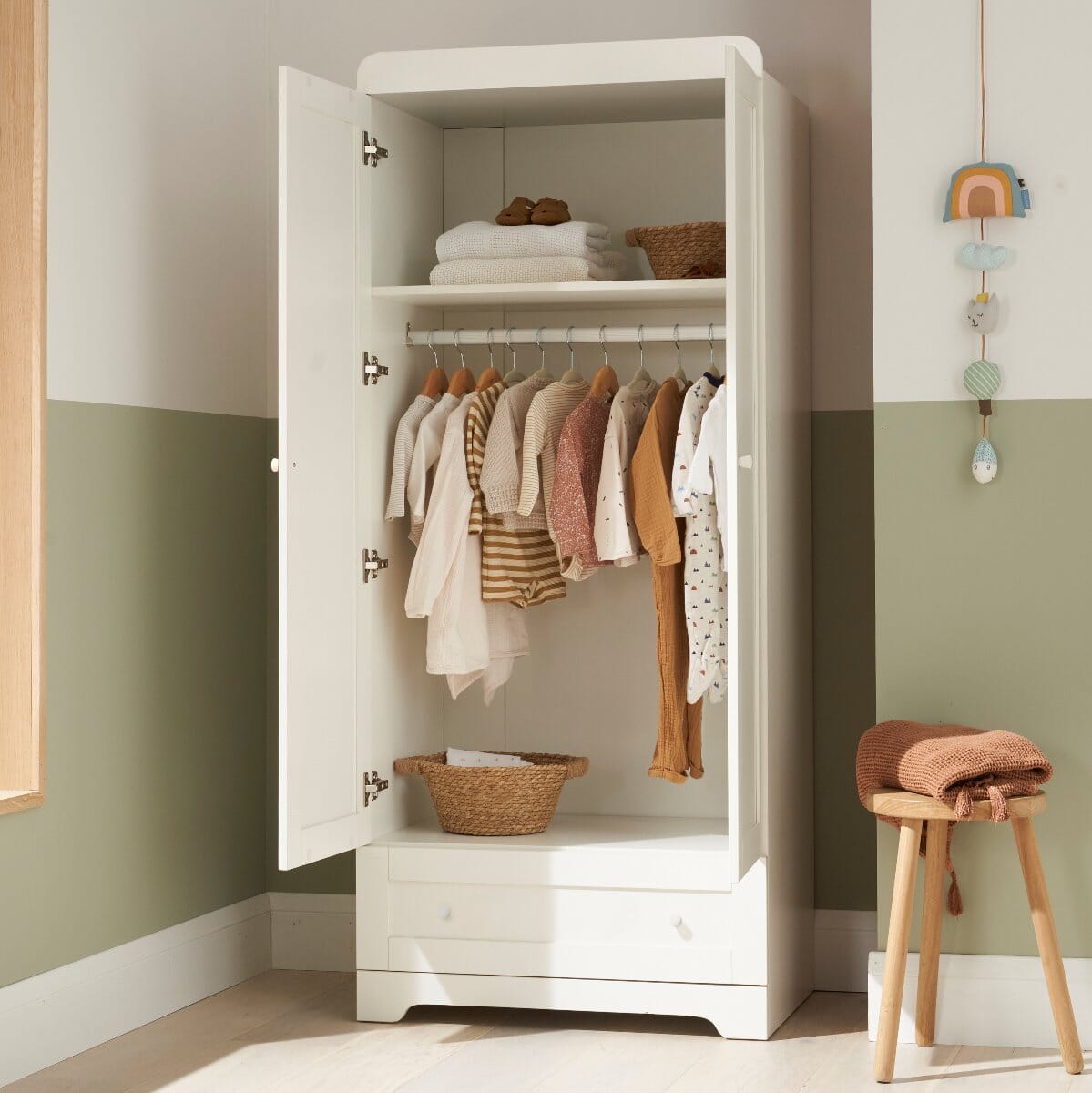 Rio Wardrobe in White with doors open – interior view showing hanging rail, open shelf, and spacious lower storage for baby clothes and essentials