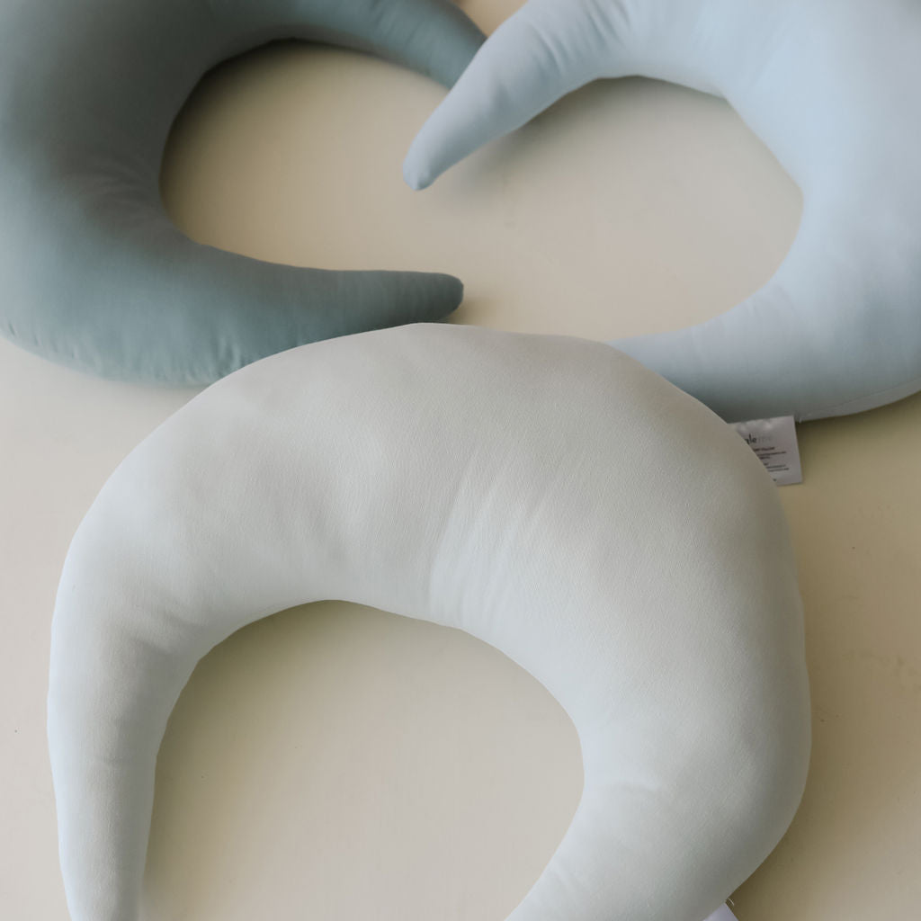 Three SMO nursing pillows in blue tones, highlighting soft textures and supportive C-shape