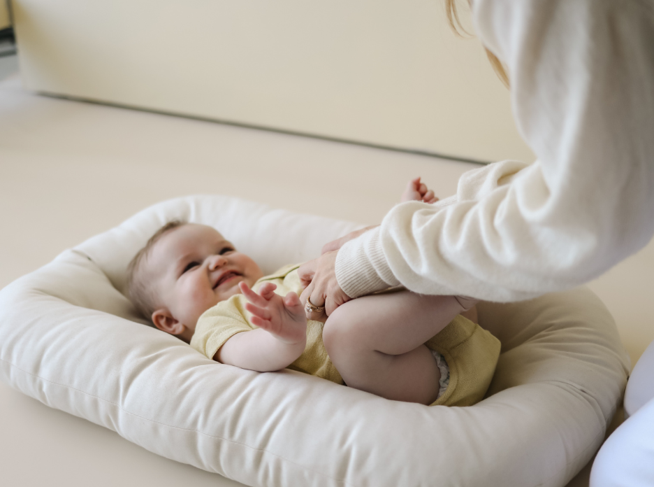 SMO Baby Lounger with baby awake and supervised—designed for safe playtime, not for unsupervised sleep.