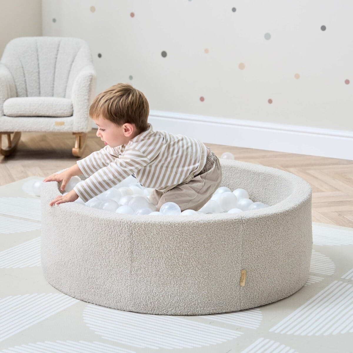 Bola Baby Ball Pit in Mushroom - lifestyle image of boy playing the ball pit