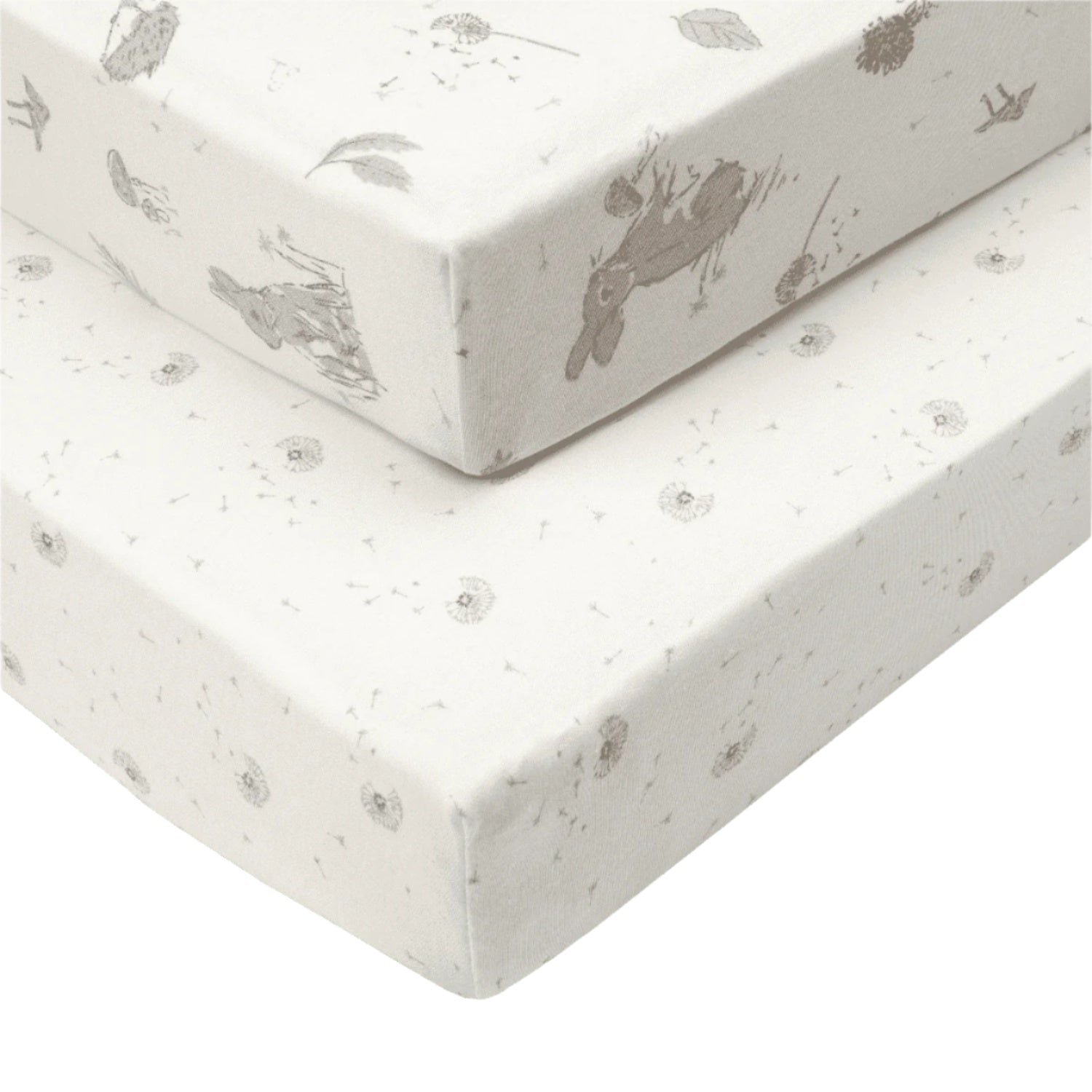 Cutout of Cocoon cot bed fitted sheets, one with woodland rabbit print and one neutral dotted, both crafted in organic cotton for breathable comfort