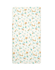 Cot bed fitted sheet from the Run Wild collection, featuring playful safari animals and foliage print in warm tones for a fun nursery look