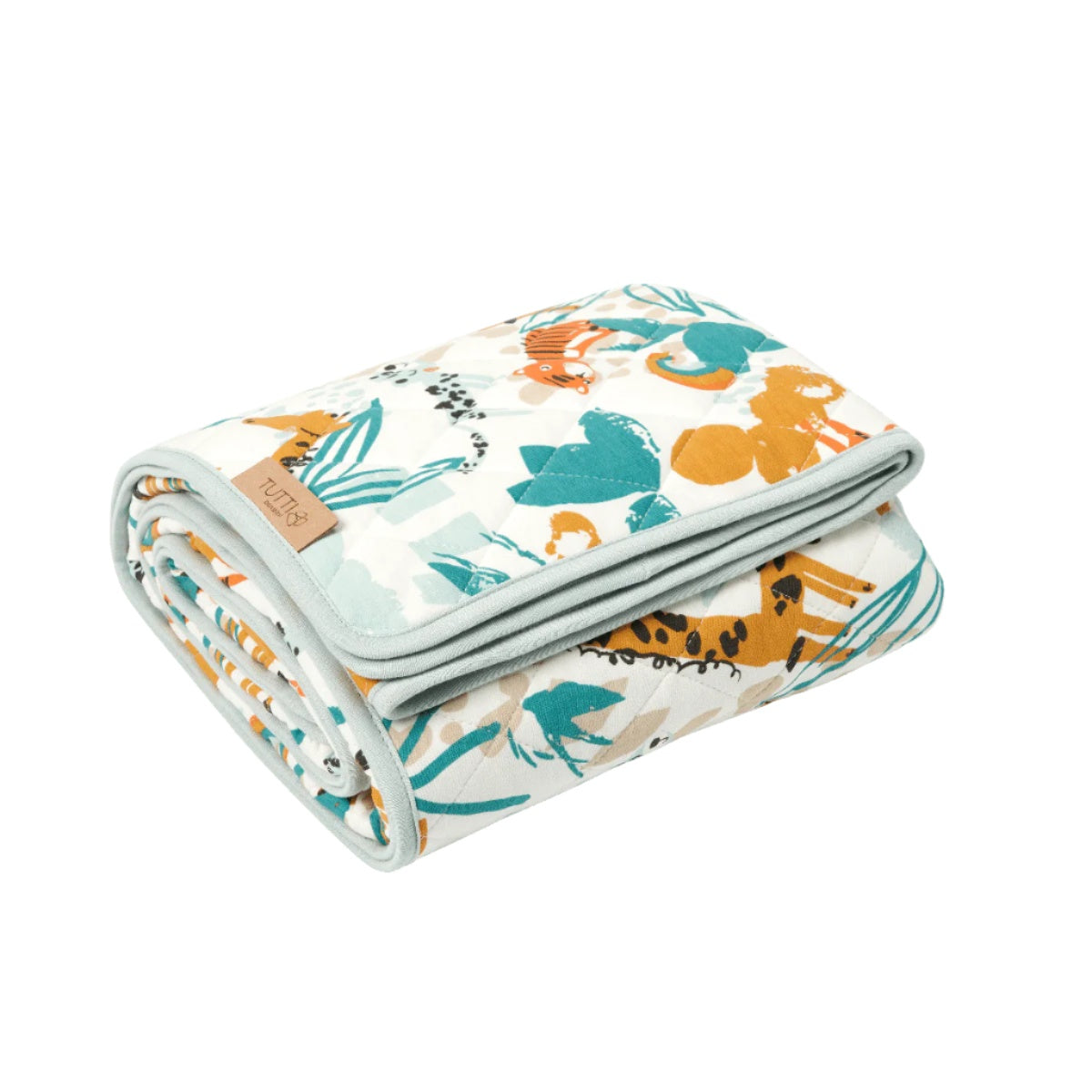 Folded cutout of Run Wild coverlet, quilted cotton layer with jungle-inspired animal prints in warm tones for softness and style