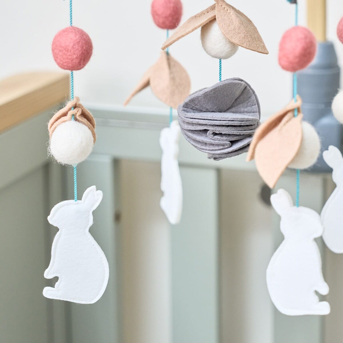 CoZee 2 in 1 Crib & Cot Mobile in Oak & Cocoon - close up on the felt details