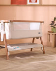CoZee Air Bedside Crib in Scandinavian and Ecru – stylish bedroom setup with mesh panel and oak-effect frame