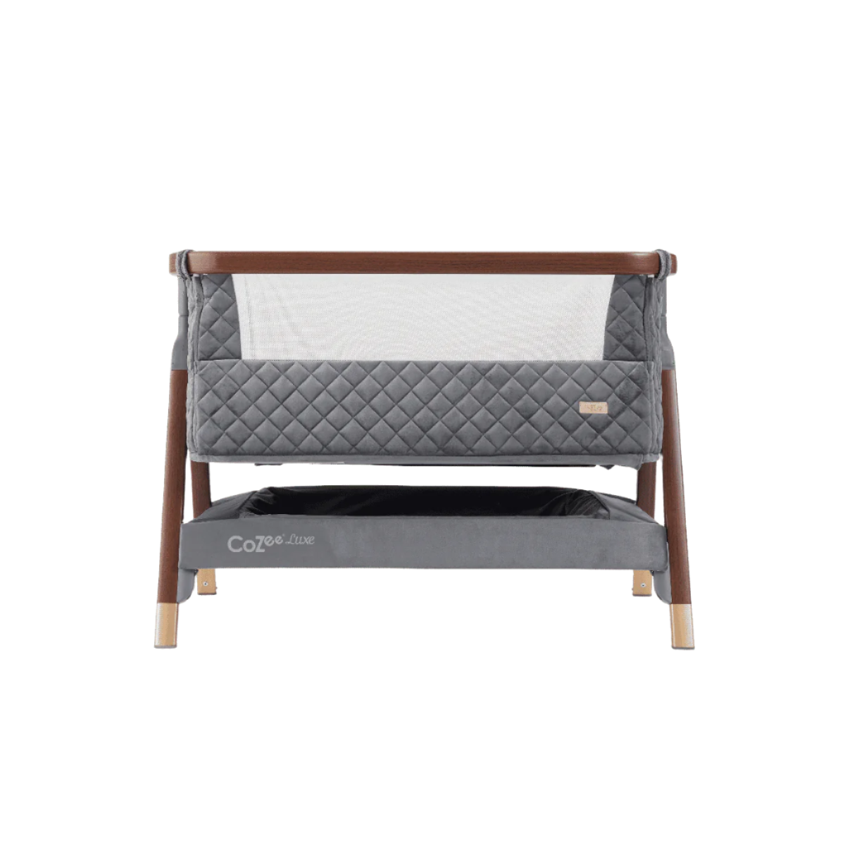 Front view of the CoZee Luxe bedside crib in walnut and slate, featuring quilted sides and a breathable mesh panel