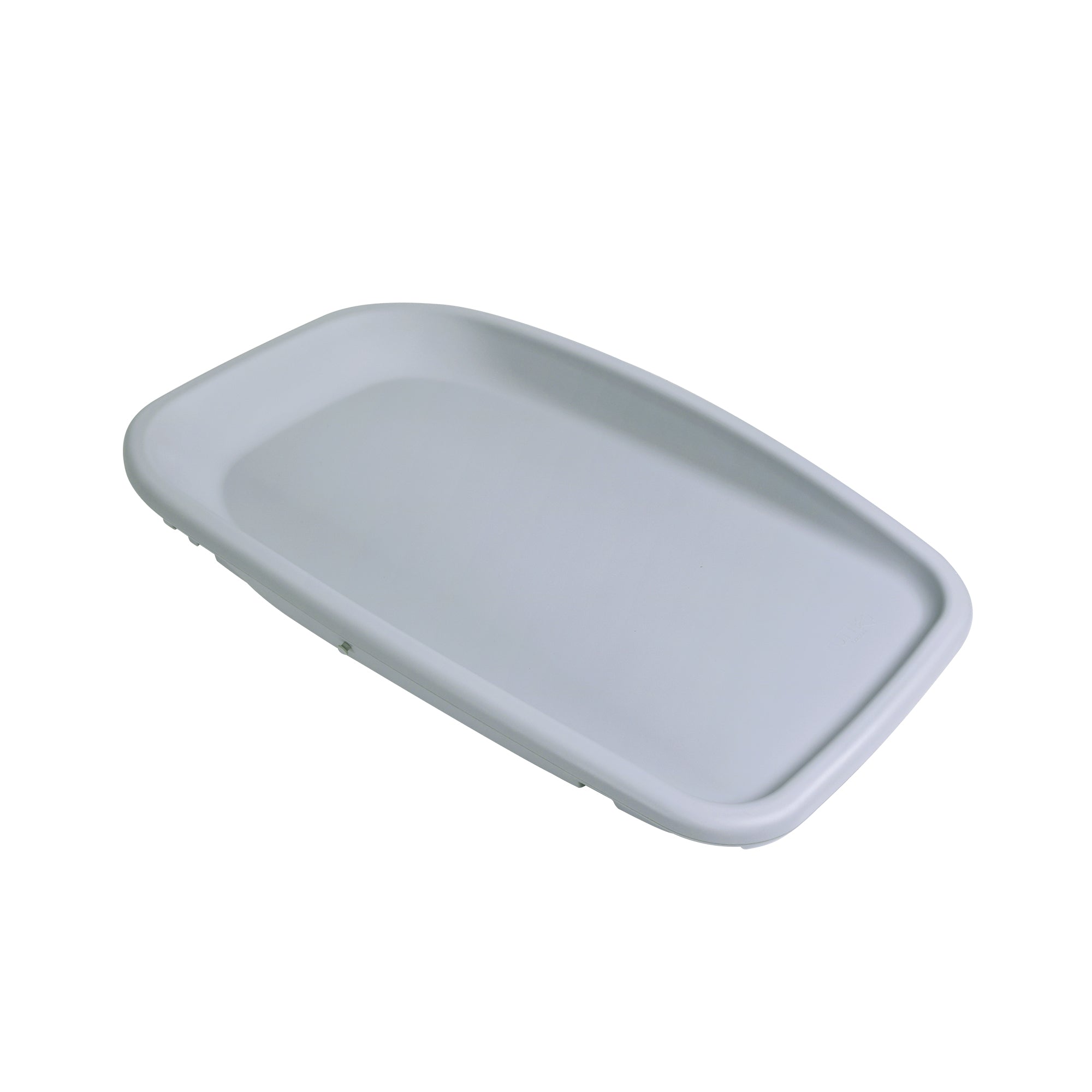 Angled cutout of the Cushi baby changing mat in cloud grey finish with raised edges for safety and smooth contoured design