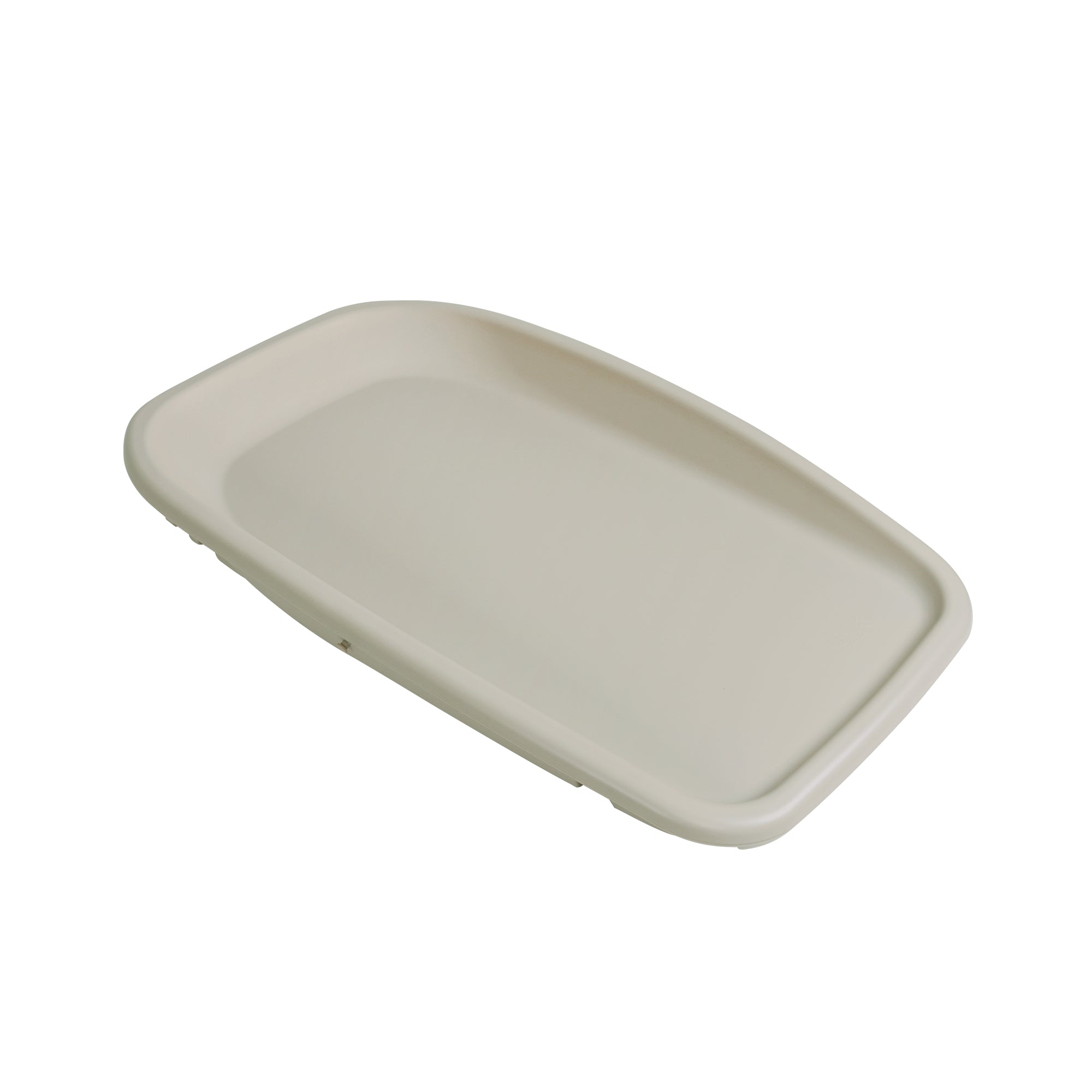 Angled cutout view of the Cushi baby changing mat in mushroom, featuring contoured raised edges for baby safety