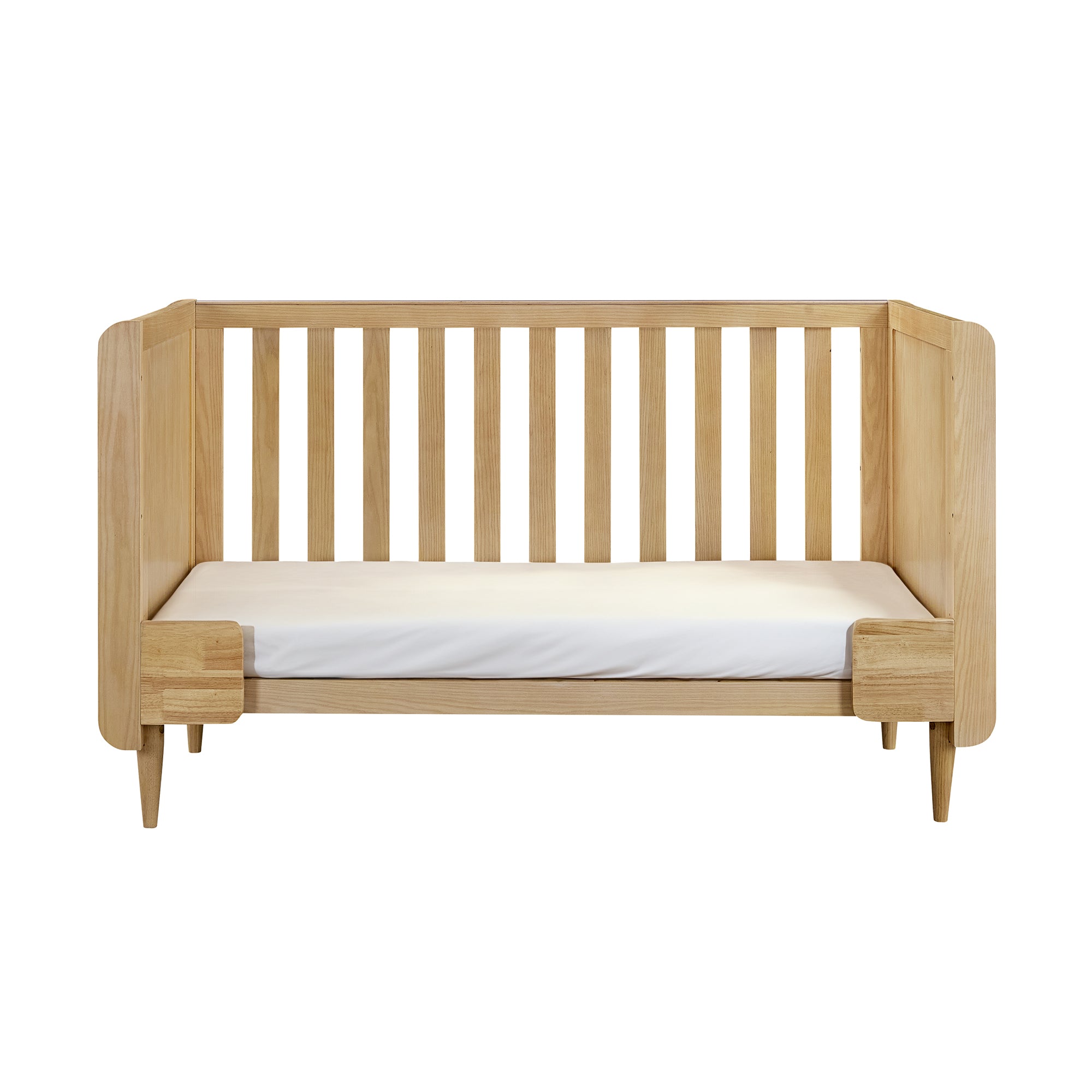 Japandi cot bed in light oak shown in sofa bed mode, with open front for easy toddler access and sleek minimalist design.