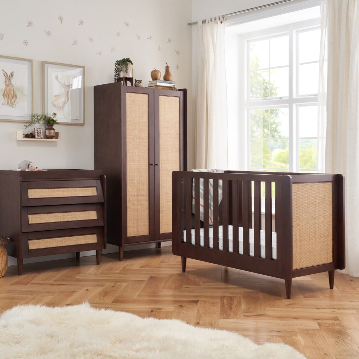 Japandi mini 3 piece room set in warm walnut, styled in a cosy room. Combines compact footprint with convertible bed and coordinated storage pieces.