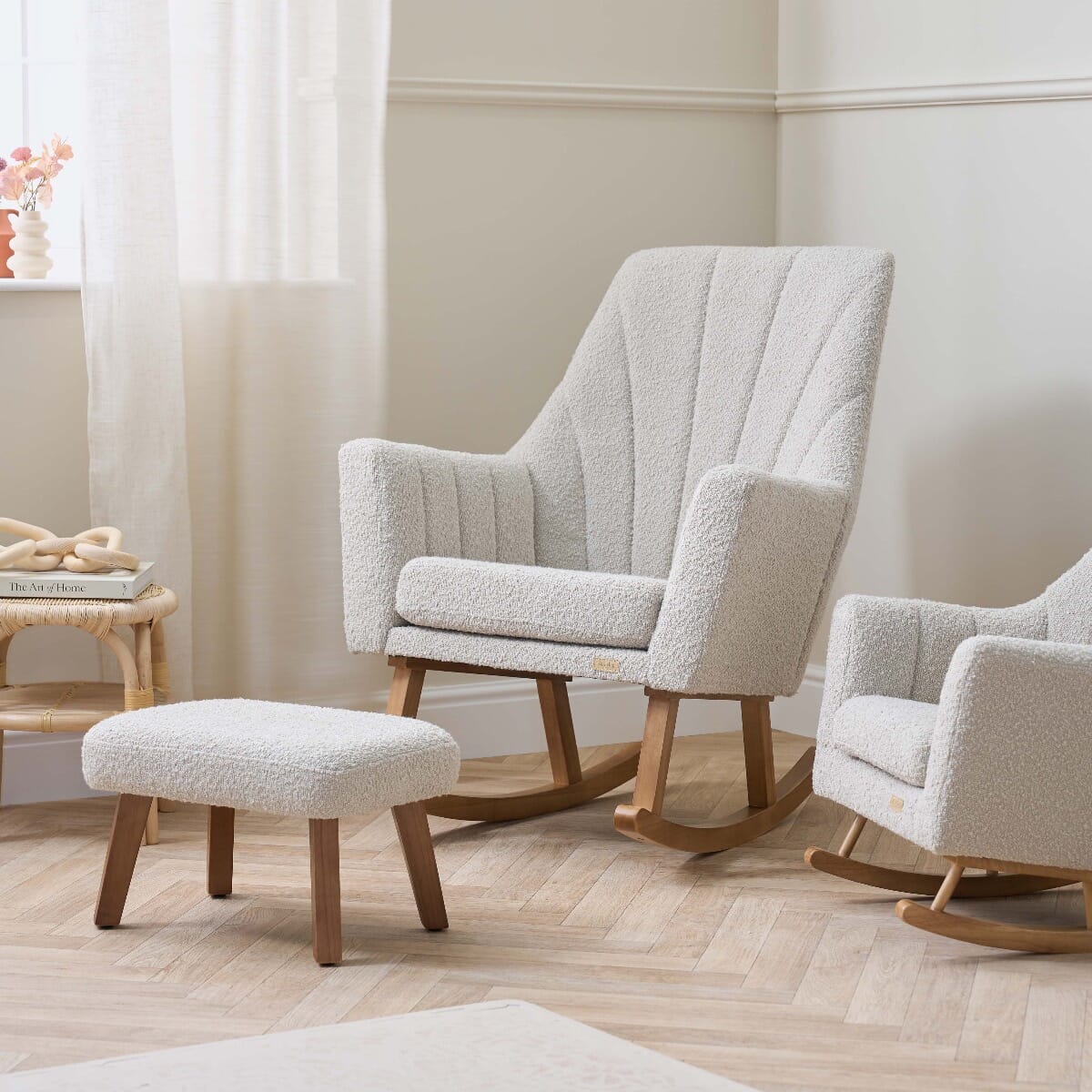 Jonah Luxe rocking chair and footstool in boucle mushroom shown in a styled nursery, paired with natural wood accents and soft light