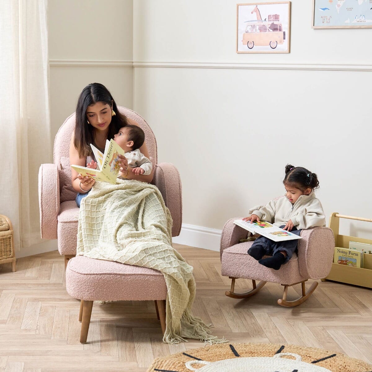 Micah Mini Me Children's Rocking Chair in Boucle Blush - lifestyle image of the mum and kids sitting in their matching Micah rocking chairs