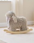 Lifestyle view of Mimi the Mammoth rocking toy styled in a playroom, combining plush comfort with a calm, neutral design