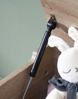 Modena Toy Box Oak featuring a soft-closing hinge mechanism to keep the lid safely propped open, protecting little fingers from accidental closures