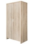 Modena wardrobe in oak finish displayed with closed doors against a white background, highlighting the clean lines and contemporary style suitable for both modern nurseries and bedrooms.