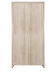The Modena nursery wardrobe in warm oak features slow closing doors and provides plenty of storage