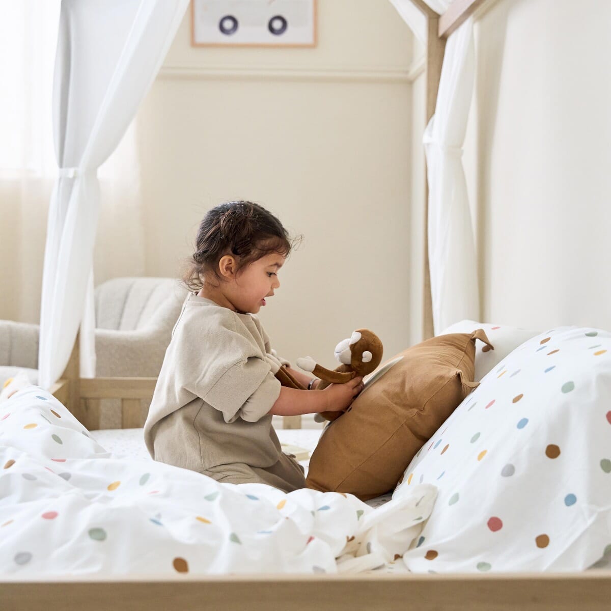 Casa Grande Montessori Kids Floor Bed in Harvest Oak - image of kid playing in the house bed