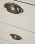 Detailed view of the sturdy metal cup handle on the Verona chest changer, designed for easy grip and smooth drawer operation