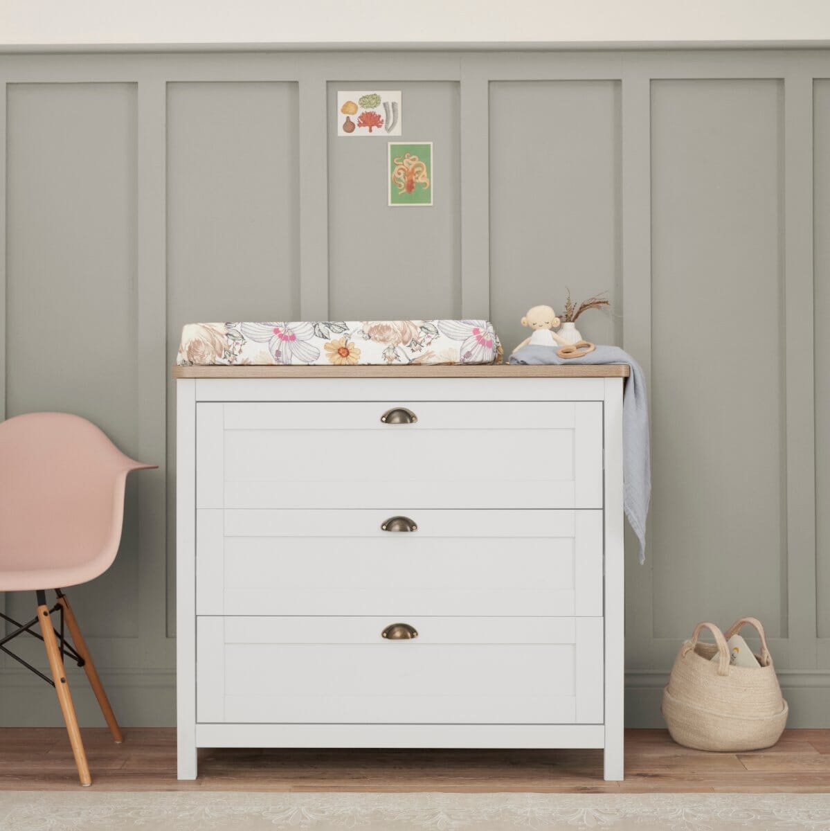 Front view of Verona chest changer in white and oak, featuring three spacious drawers for nursery storage