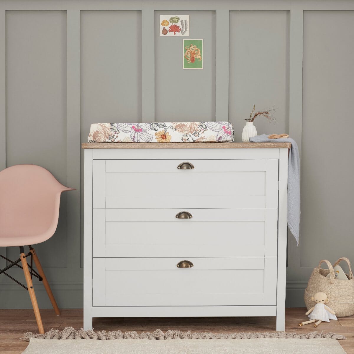Verona chest changer in white and oak with three deep drawers, combining style and functionality for nursery storage and baby changing.