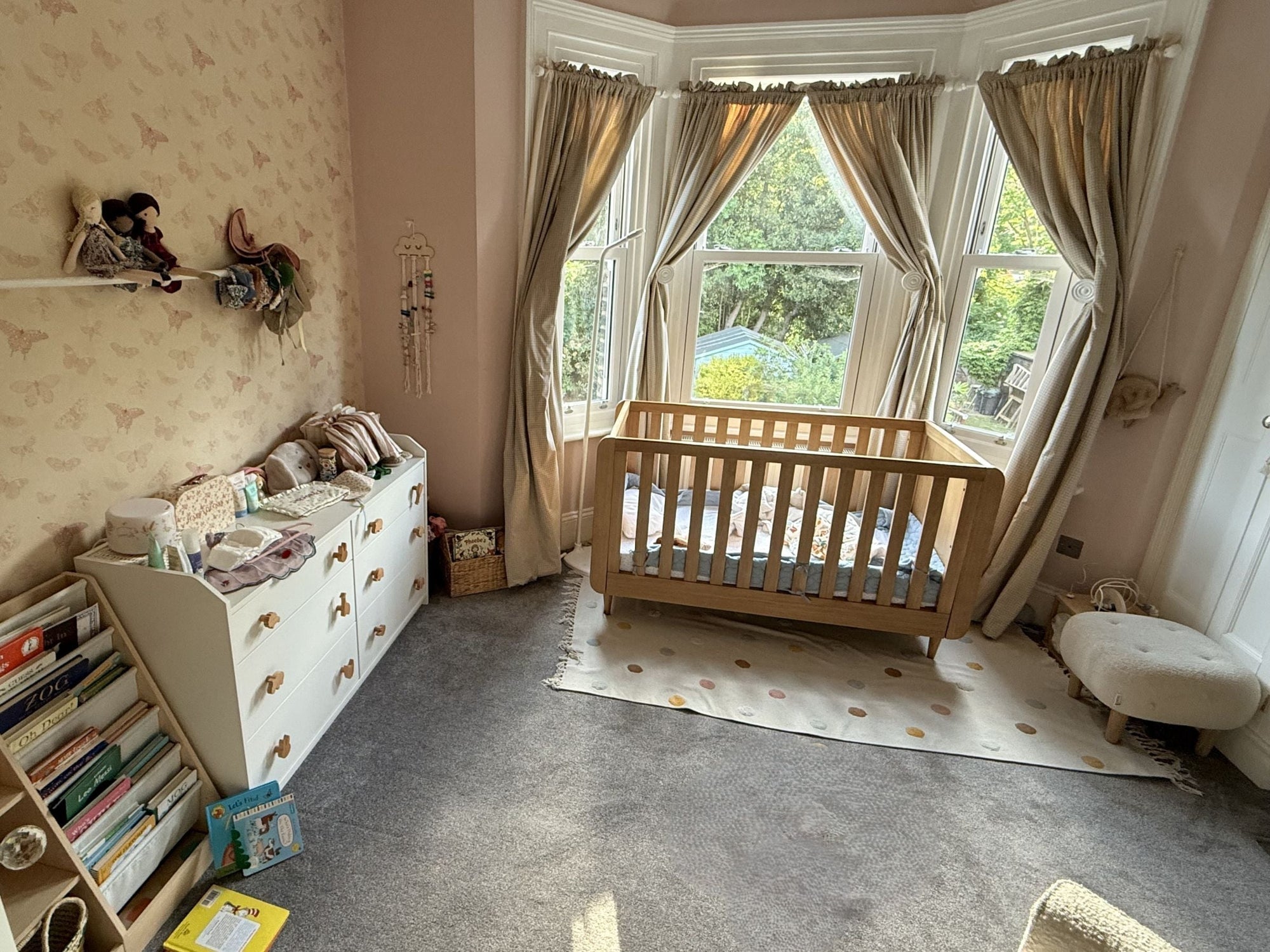 Japandi Cot Bed shown in a nursery with natural light by the window