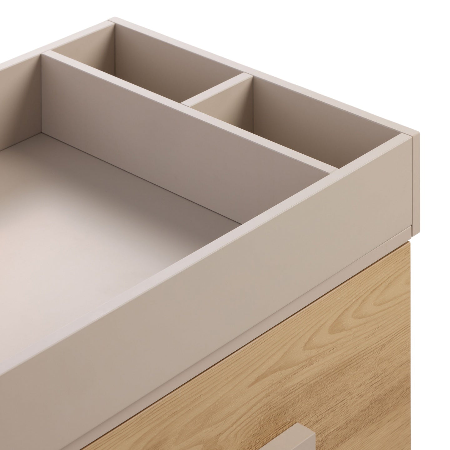 Detail of Hallee chest changer changing top in mushroom finish with integrated storage compartments.