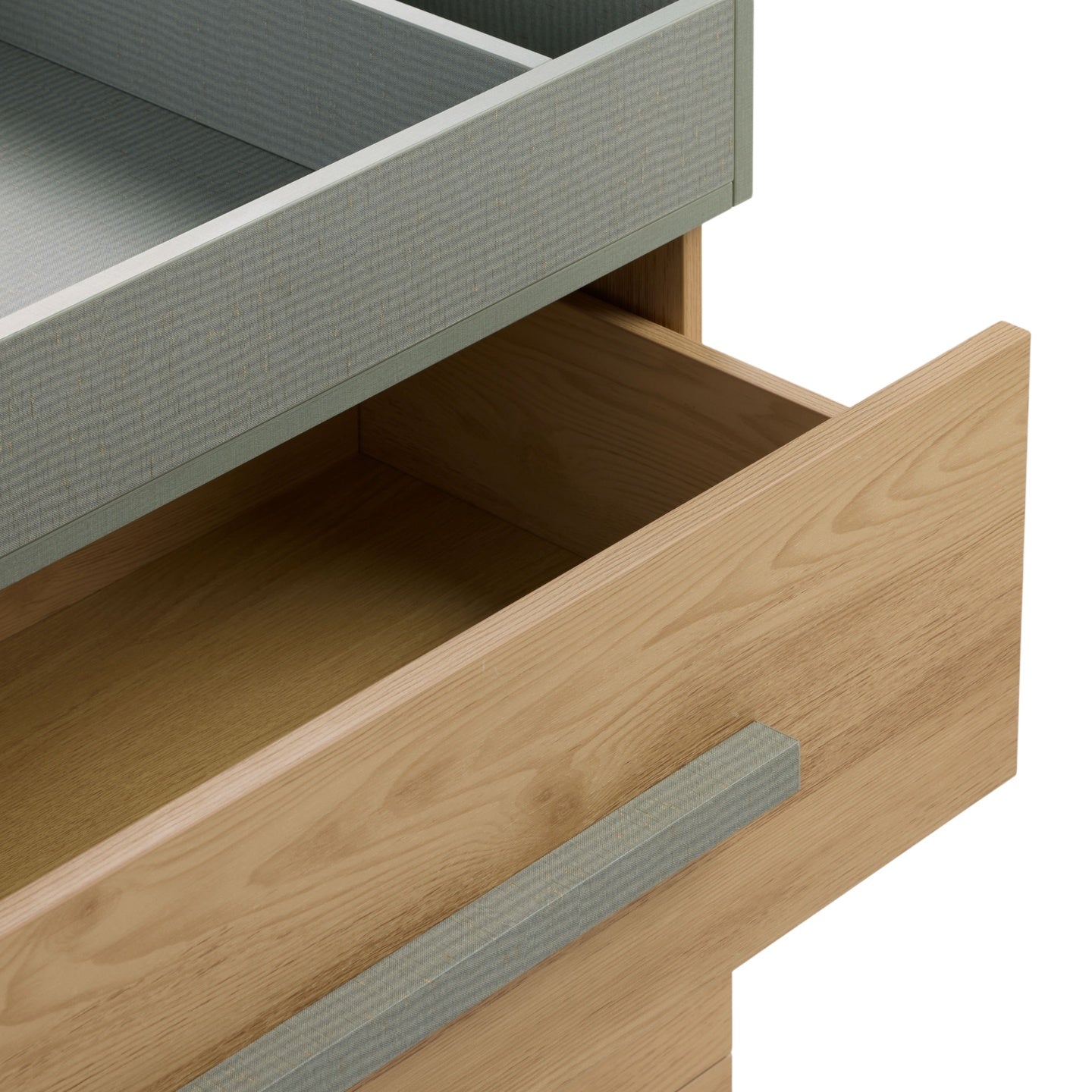 Close-up of Hallee chest drawer in sage weave and golden oak, showing smooth glide storage and textured sage handle.