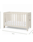 An infographic of a cot bed with dimension markings showing 125 cm length, 68 cm width, and 81.5 cm height, on a plain white background.
