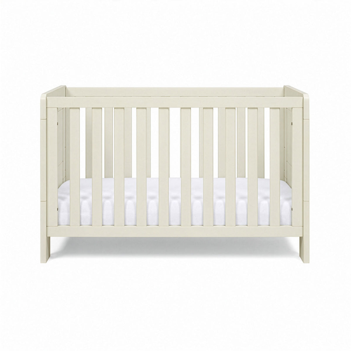 The Alba mini cot bed in cashmere with a mattress on a white background.