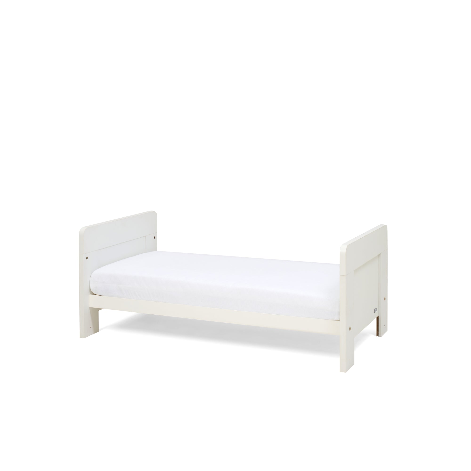 Alba Mini Cot bed in the toddler bed mode with a mattress on a white background