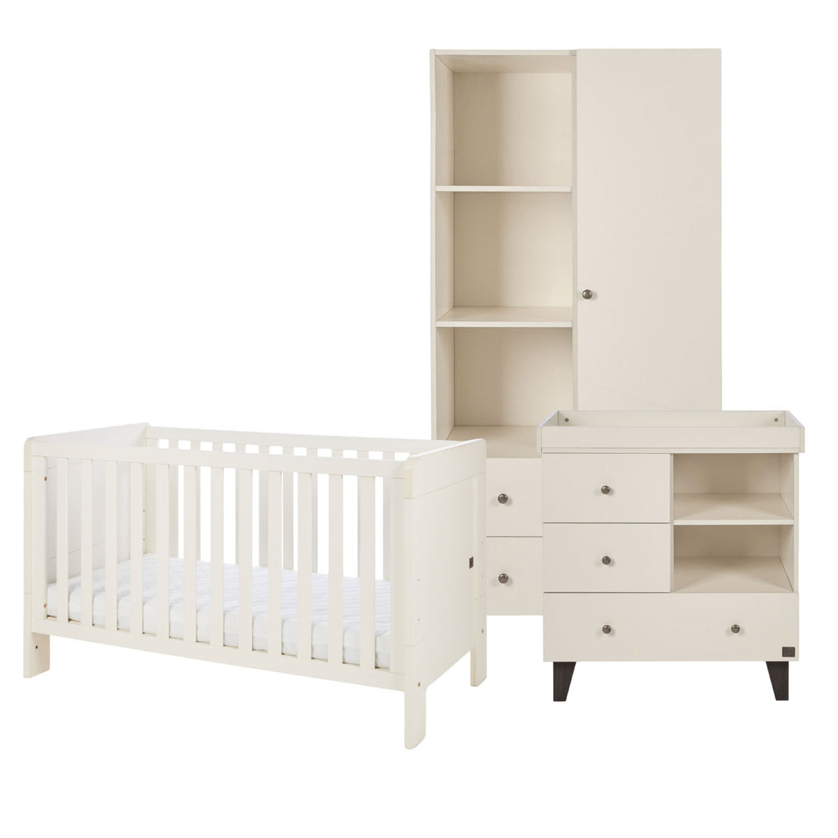 A three-piece baby furniture set in a warm off-white finish, including a convertible cot bed, a changing table with drawers, and a tall wardrobe with shelves, shown on a solid white background.