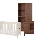 A nursery furniture set including a white convertible cot bed, a dark brown wooden wardrobe, and a matching changing table with drawers and shelves, shown on a solid white background.