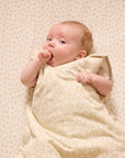 Close-up of baby resting in the Love Cats baby sleep bag, featuring soft  fabric for gentle comfort