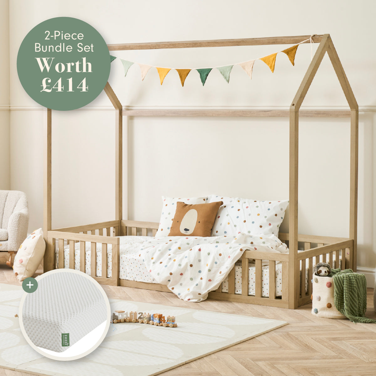 A wooden house-frame toddler bed with bedding and pillows, shown in a styled nursery setting. A green circular badge in the top left reads '2-Piece Bundle Set Worth £414'.
