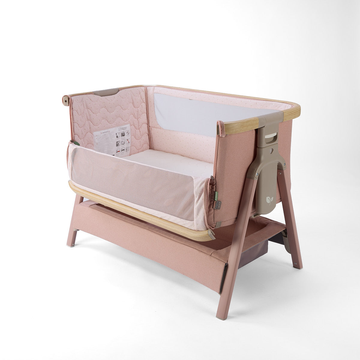 CoZee Air 2 bedside crib in blush, with open side, storage, 6 height positions in a white background 