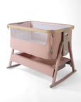CoZee Air 2 bedside crib in blush with rocking bars, storage, 6 height positions in a white background 