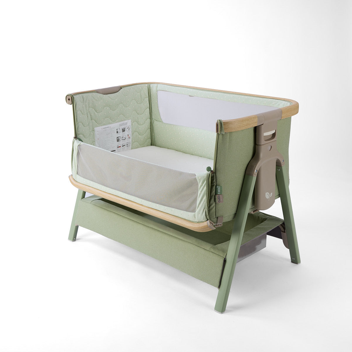 CoZee Air 2 bedside crib in green with side open, storage, 6 height positions,  in a white background 